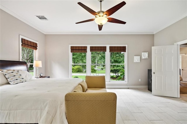 42532 S Range Rd, Hammond, LA 70403 - bedroom featuring multiple windows, crown molding, baseboards, and a ceiling fan