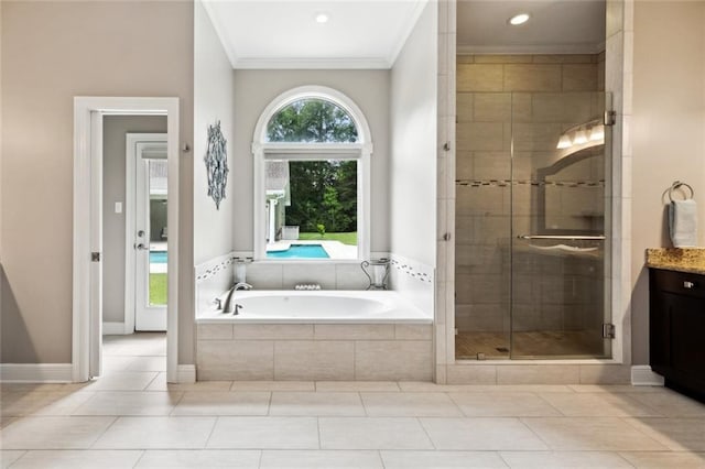 42532 S Range Rd, Hammond, LA 70403 - bathroom featuring ornamental molding, a bath, vanity, a shower stall, and tile patterned floors