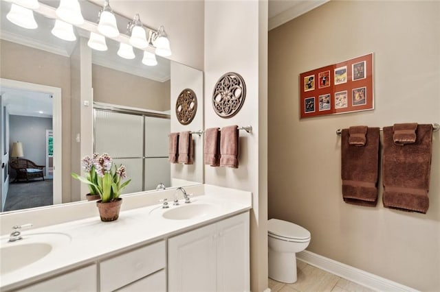 42532 S Range Rd, Hammond, LA 70403 - full bath featuring crown molding, toilet, double vanity, a shower with door, and baseboards