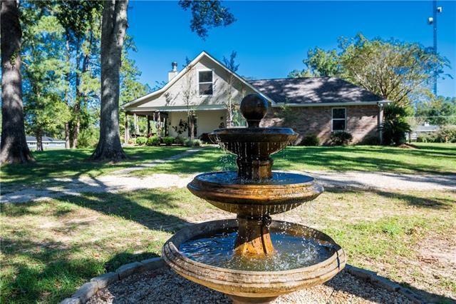 28209 Honey Beagle Ln, Ponchatoula, LA 70454 - view of front of property featuring a front lawn