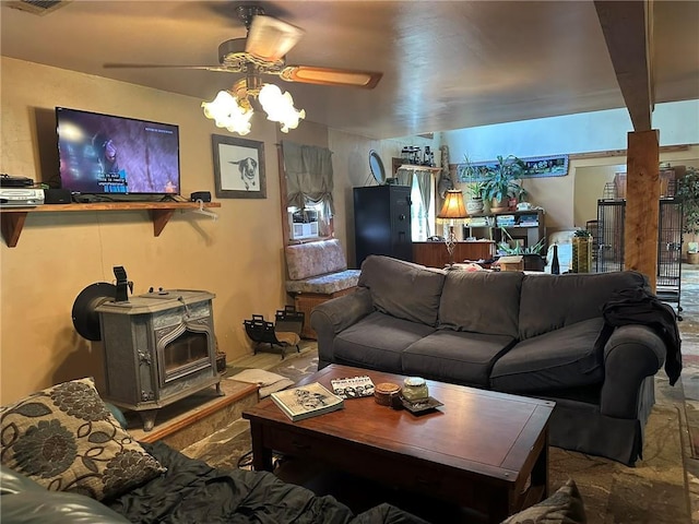 30010 River Rd, Mount Hermon, LA 70450 - living room with a ceiling fan and a wood stove