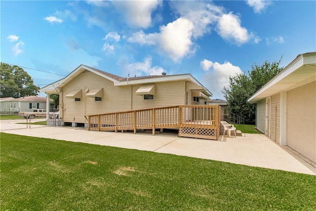 2904 Lloyds Ave, Chalmette, LA 70043 - rear view of property with a yard, a deck, and a patio