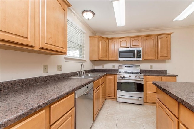 2904 Lloyds Ave, Chalmette, LA 70043 - kitchen with stainless steel appliances, a sink, crown molding, dark countertops, and light tile patterned floors