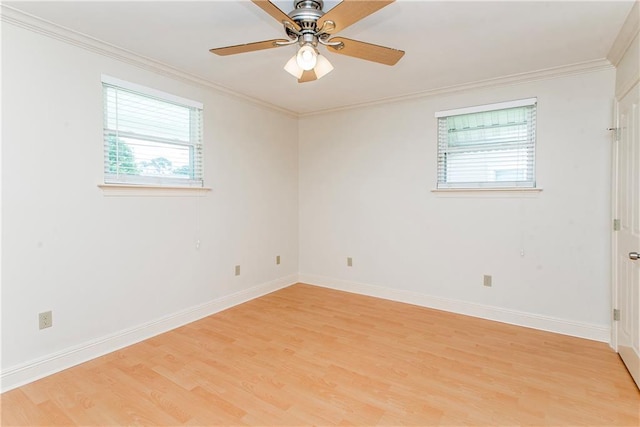 2904 Lloyds Ave, Chalmette, LA 70043 - unfurnished room with light wood-style floors, ornamental molding, ceiling fan, and baseboards