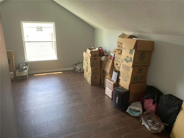 2133 Wellington Ln, Slidell, LA 70461 - additional living space with lofted ceiling and a textured ceiling