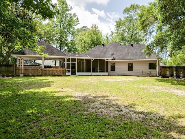 136 Oak Leaf Dr, Slidell, LA 70461 - rear view of house with a sunroom and roof with shingles