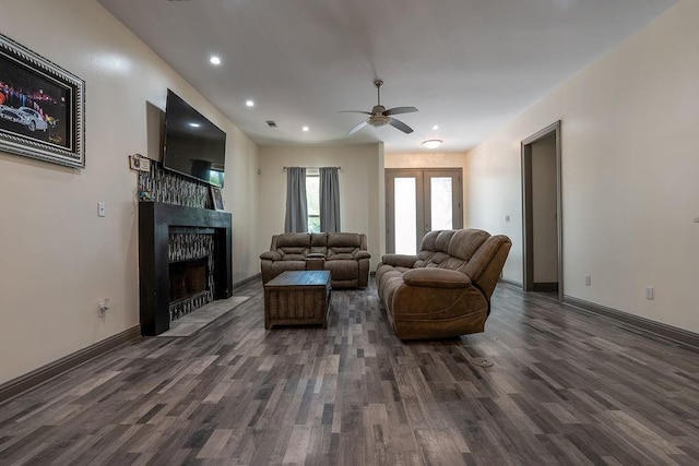 136 Oak Leaf Dr, Slidell, LA 70461 - living room with wood finished floors, a ceiling fan, a fireplace with flush hearth, recessed lighting, and baseboards