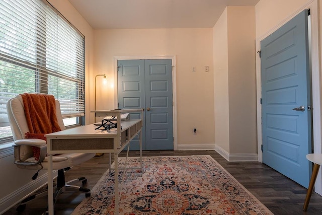 136 Oak Leaf Dr, Slidell, LA 70461 - home office featuring dark wood-style floors and baseboards