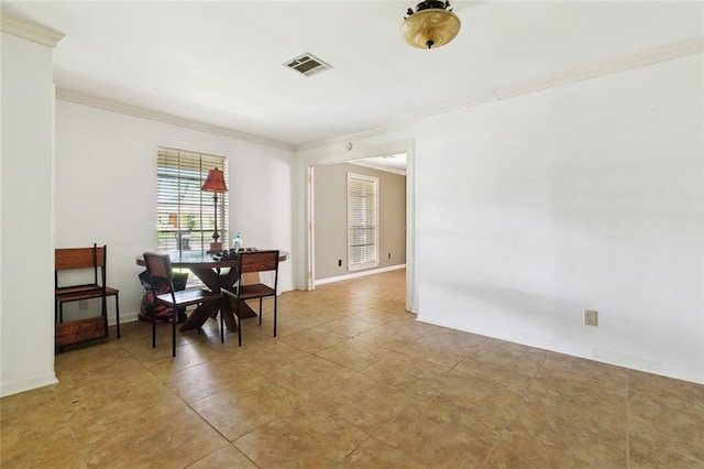 5936 Dover Pl, New Orleans, LA 70131 - dining space with crown molding, light tile patterned floors, and baseboards