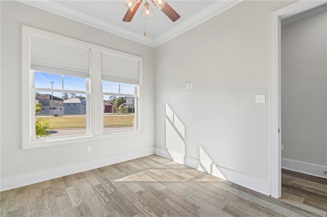344 Ormond Dr, Covington, LA 70433 - empty room featuring wood finished floors, a ceiling fan, ornamental molding, and baseboards
