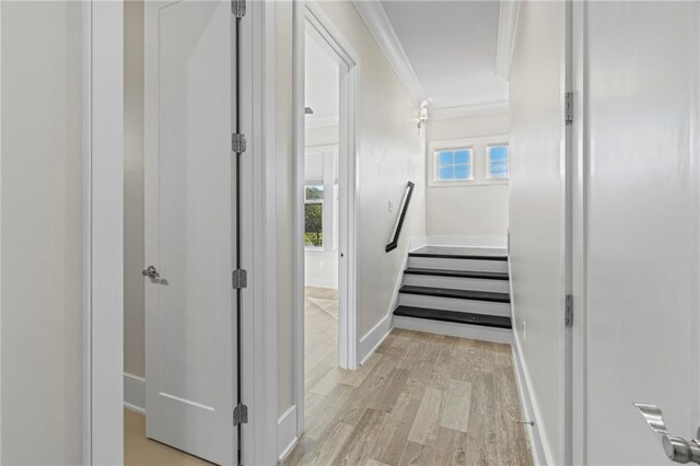 344 Ormond Dr, Covington, LA 70433 - corridor featuring crown molding, light wood finished floors, baseboards, and stairs