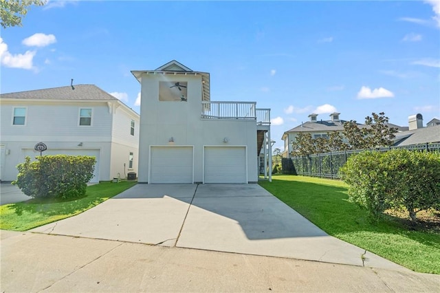 344 Ormond Dr, Covington, LA 70433 - view of front of property with a balcony, a garage, concrete driveway, and stucco siding