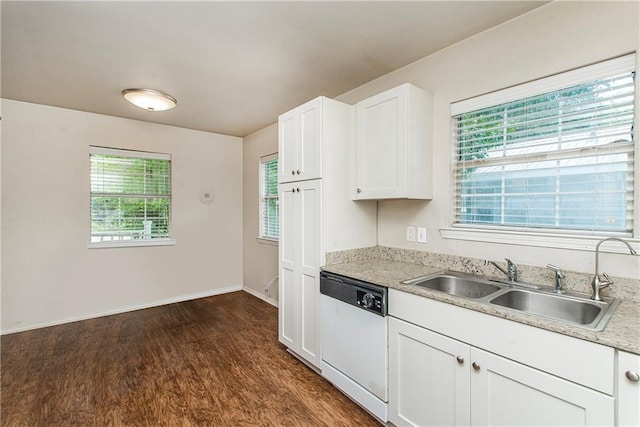 1029 W 32nd Ave, Covington, LA 70433 - kitchen with dishwasher, dark wood-style flooring, a sink, and plenty of natural light