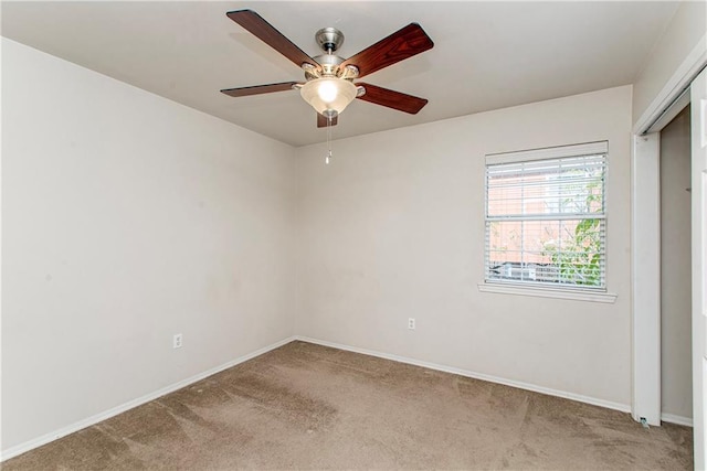 1029 W 32nd Ave, Covington, LA 70433 - carpeted spare room featuring a ceiling fan and baseboards