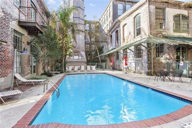 920 Poeyfarre St Unit 176, New Orleans, LA 70130 - community pool featuring a patio area