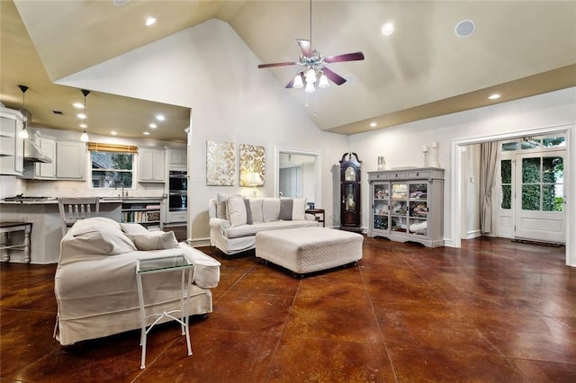234 Blue Crane 1 Dr, Slidell, LA 70461 - living area with high vaulted ceiling, a ceiling fan, healthy amount of natural light, and recessed lighting