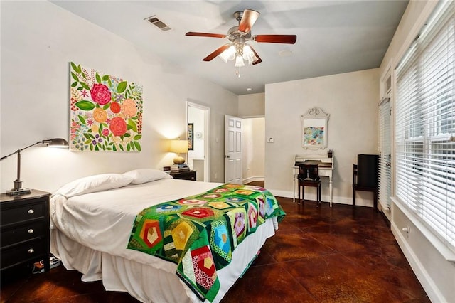 234 Blue Crane 1 Dr, Slidell, LA 70461 - bedroom featuring baseboards, ceiling fan, and finished concrete floors