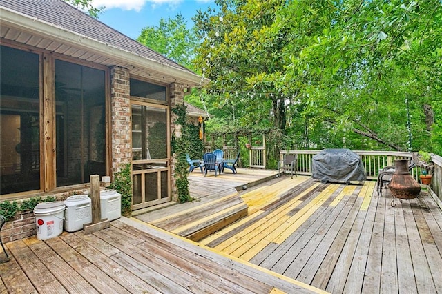 234 Blue Crane 1 Dr, Slidell, LA 70461 - deck featuring a grill and a sunroom