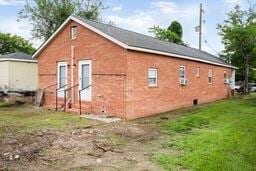 291618 Andover St, Jefferson, LA 70121 - view of property exterior featuring a yard and brick siding