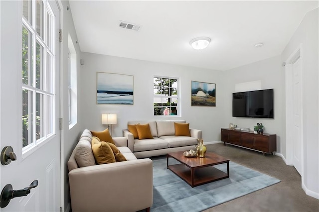 415 Ridgewood Dr, Mandeville, LA 70471 - carpeted living area with baseboards