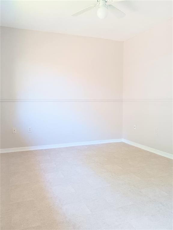 1938 Longwood Ct, La Place, LA 70068 - empty room featuring ceiling fan and baseboards