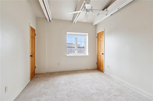1020 Esplanade Ave Unit 204, New Orleans, LA 70116 - spare room featuring carpet, ceiling fan, and baseboards