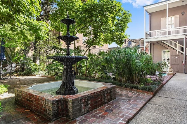 1020 Esplanade Ave Unit 204, New Orleans, LA 70116 - view of property's community with stairway