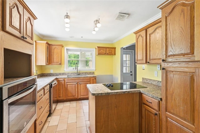 23396 S Maple Dr, Ponchatoula, LA 70454 - kitchen with stainless steel appliances, a sink, plenty of natural light, a peninsula, and ornamental molding