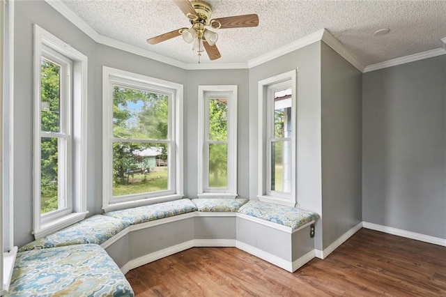 23396 S Maple Dr, Ponchatoula, LA 70454 - unfurnished room with healthy amount of natural light, wood finished floors, baseboards, a textured ceiling, and ornamental molding