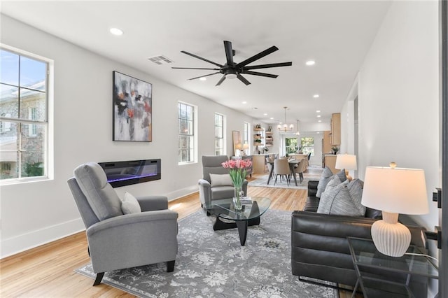 2526 Metairie Rd, Metairie, LA 70001 - living room featuring ceiling fan, recessed lighting, wood finished floors, and baseboards