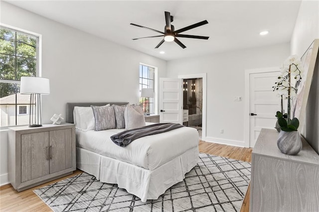 2526 Metairie Rd, Metairie, LA 70001 - bedroom with multiple windows, light wood-type flooring, recessed lighting, and ensuite bathroom