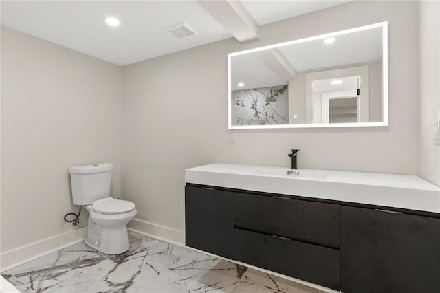 2526 Metairie Rd, Metairie, LA 70001 - bathroom featuring vanity, toilet, marble finish flooring, recessed lighting, and baseboards