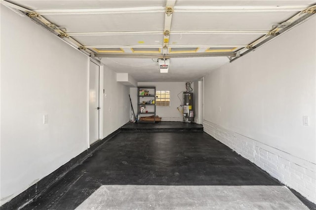2526 Metairie Rd, Metairie, LA 70001 - garage featuring water heater and a garage door opener