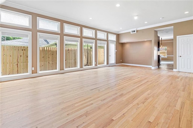 1 Miller Ln, Metairie, LA 70002 - unfurnished living room with crown molding, light wood-type flooring, recessed lighting, and baseboards