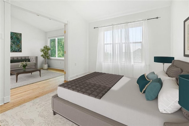 1 Miller Ln, Metairie, LA 70002 - bedroom featuring vaulted ceiling, wood finished floors, and baseboards
