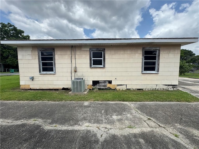 127 5th St, Bridge City, LA 70094 - view of side of home with central AC unit