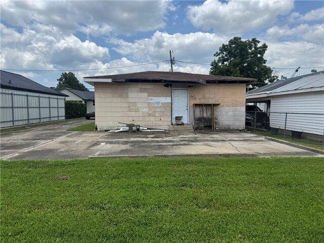 127 5th St, Bridge City, LA 70094 - rear view of property featuring a patio