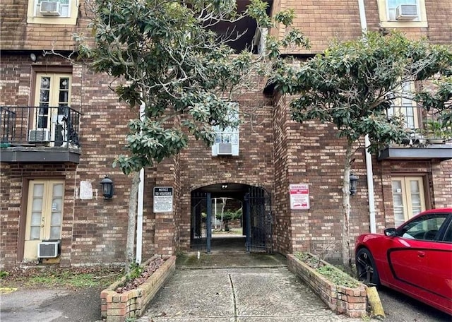 6220 Riverside Dr Unit 556, Metairie, LA 70003 - property entrance featuring brick siding