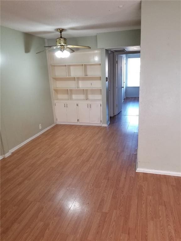 6220 Riverside Dr Unit 556, Metairie, LA 70003 - spare room with light wood-type flooring, baseboards, and ceiling fan