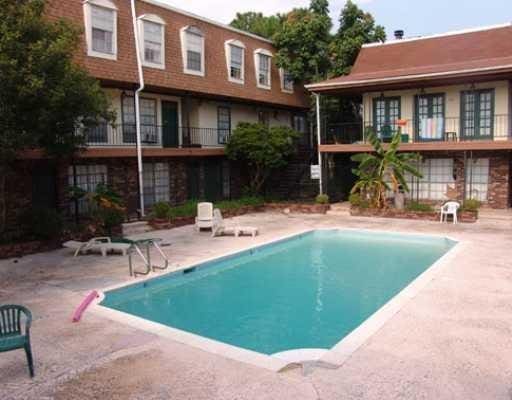 6220 Riverside Dr Unit 556, Metairie, LA 70003 - community pool with a patio area