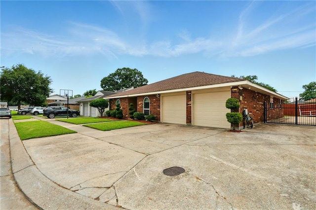 1900 Woods Dr, Metairie, LA 70001 - ranch-style home with a garage, driveway, and brick siding