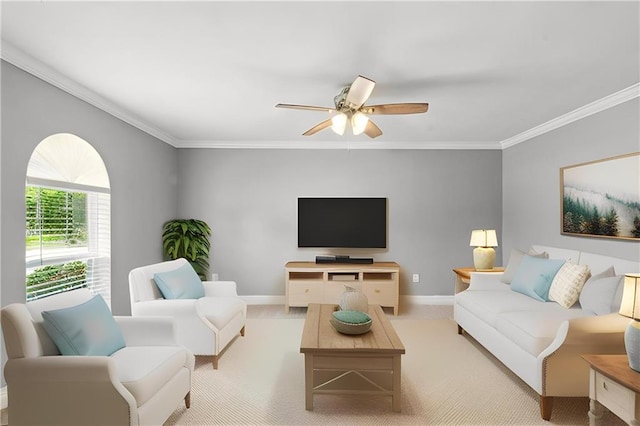 1900 Woods Dr, Metairie, LA 70001 - living room featuring ornamental molding, baseboards, ceiling fan, and light carpet