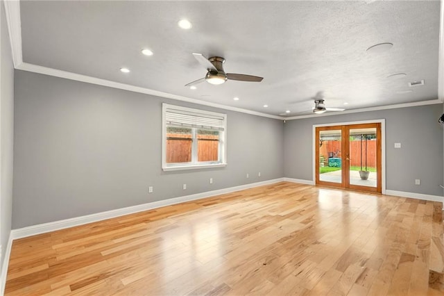 1900 Woods Dr, Metairie, LA 70001 - unfurnished room featuring ceiling fan, plenty of natural light, ornamental molding, recessed lighting, and light wood-style flooring