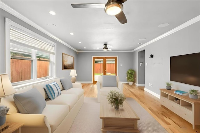 1900 Woods Dr, Metairie, LA 70001 - living area with ceiling fan, light wood-style flooring, recessed lighting, crown molding, and baseboards