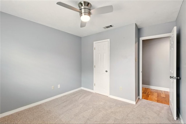 1900 Woods Dr, Metairie, LA 70001 - unfurnished bedroom with carpet flooring, baseboards, and a ceiling fan
