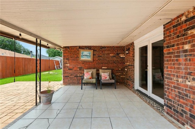 1900 Woods Dr, Metairie, LA 70001 - view of patio with a storage shed