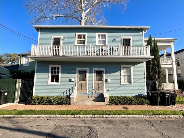 402527 Constance St, New Orleans, LA 70115 - view of front of house with entry steps and a balcony