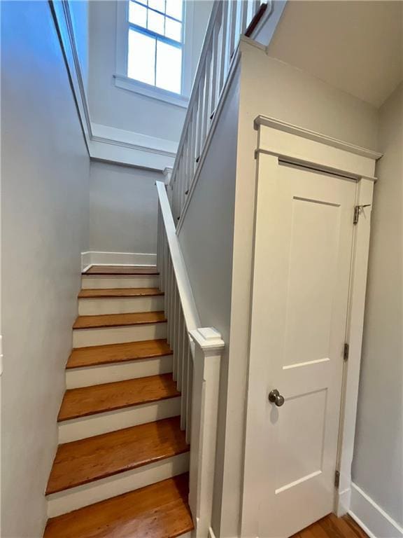 402527 Constance St, New Orleans, LA 70115 - stairs with wood finished floors and baseboards