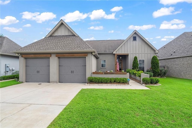 421 Tiger Ave, Covington, LA 70433 - view of front facade with board and batten siding, driveway, an attached garage, and a front lawn