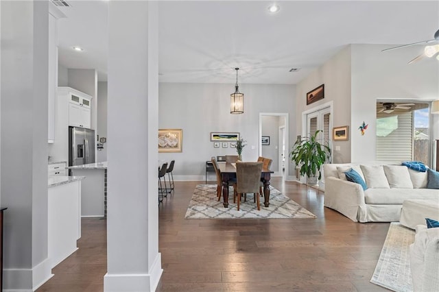 421 Tiger Ave, Covington, LA 70433 - dining area with dark wood finished floors, a ceiling fan, recessed lighting, and baseboards